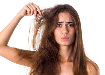 Woman,With,Half,Of,Hair,Straight,And,Half,Tangled Causes of Hair Tangles and Innovative Solutions