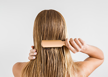 Woman,With,Comb,Brushing,Her,Wet,Blonde,Hair,After,Shower wet or dry